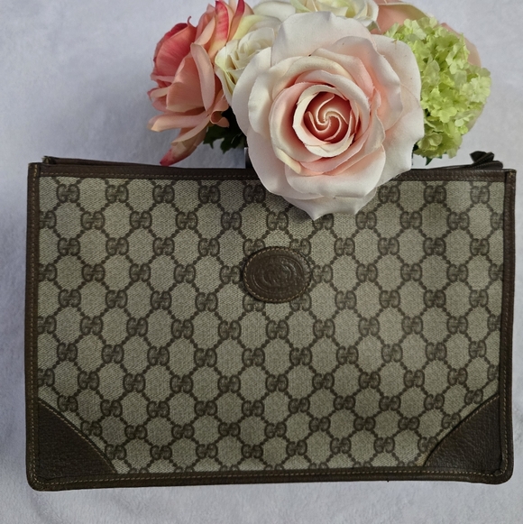 Gucci Handbags - Gucci Brown Monogram Clutch Pouch Bag
